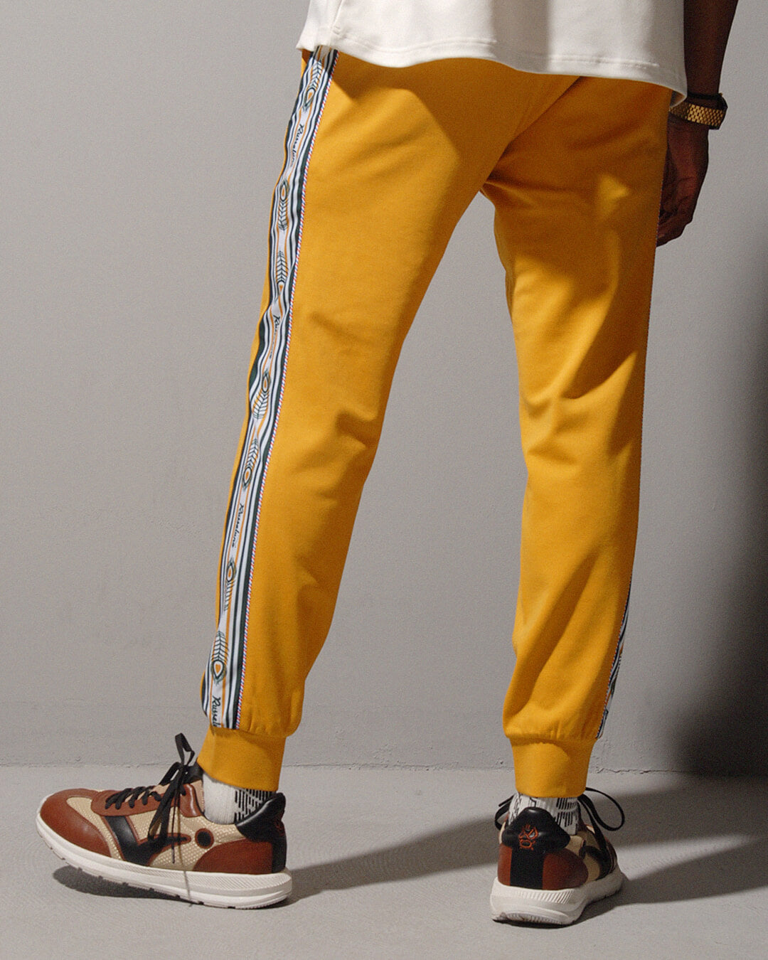 PEACOCK LINE TRACK PANTS – Russeluno Globel Official PEACOCK LINE TRACK PANTS – Russeluno Globel Official